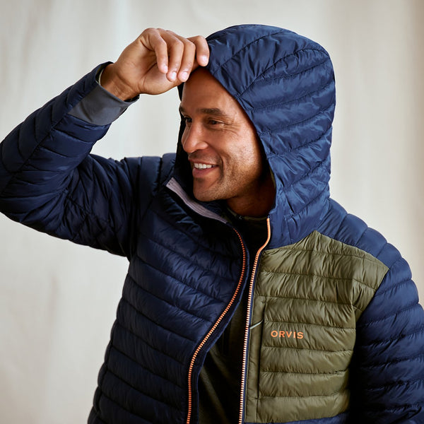 man smiling wearing darkblue winter jacket 