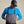 Load image into Gallery viewer, man wearing blue half zipped shirt and dark grey waders
