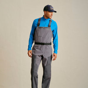 man modelling dark grey fishing cap and dark grey waders