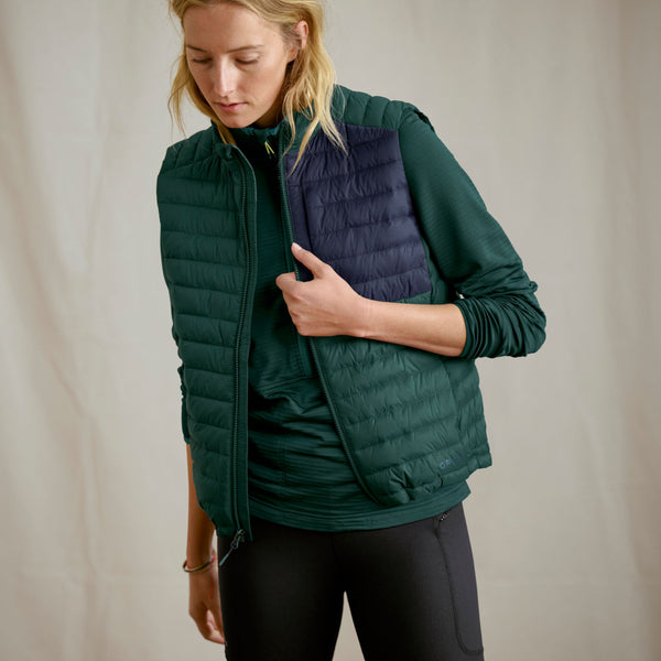 women modelling dark green fishing vest