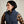 Load image into Gallery viewer, Woman wearing a blue vest over a plaid shirt against a neutral background
