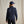 Load image into Gallery viewer, Person wearing a navy jacket and cap on a beige background
