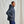 Load image into Gallery viewer, Man wearing a dark blue jacket against a plain background

