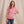 Load image into Gallery viewer, woman laughing wearing red and white shirt infront of white background
