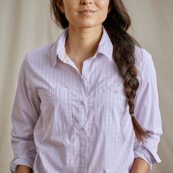 closeup of woman wearing pink shirt from Orvis