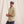 Load image into Gallery viewer, man looking into the camera wearing blue cap, beige shirt and blue pants
