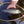 Load image into Gallery viewer, fish being held over fishing net

