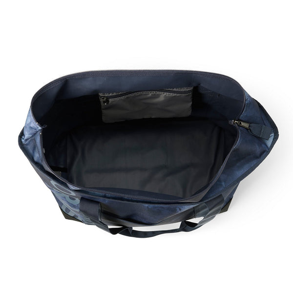inside blue fishing bag on white background