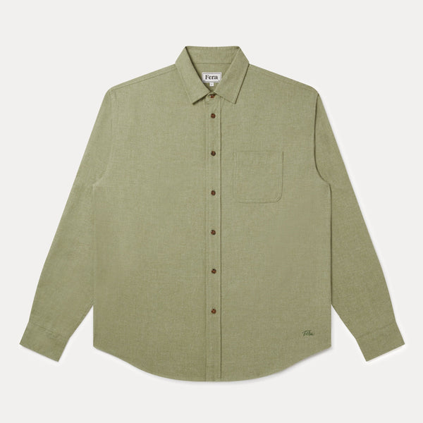 A sage green long-sleeve button-up shirt with a chest pocket, laid flat against a light gray background.