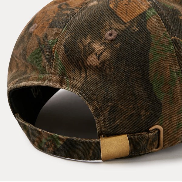 Camouflage-patterned baseball cap on a white background