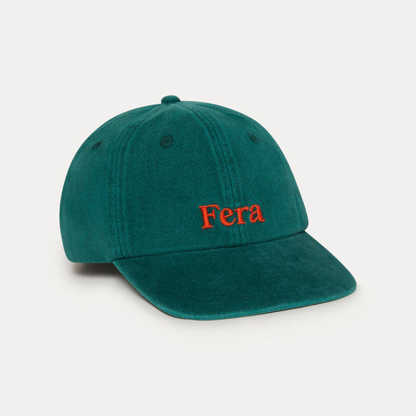 Brown baseball cap with a logo on a light gray background