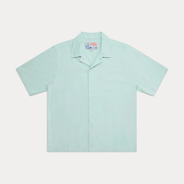 light green short sleeved shirt on white background