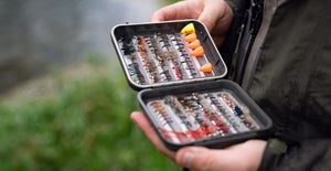 Man showing flybox from Orvis