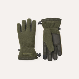 Pair of green gloves with black accents on a light gray background