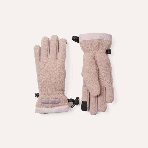 Pair of pink gloves with fleece lining on a white background