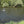 Load image into Gallery viewer, man fly fishing in river
