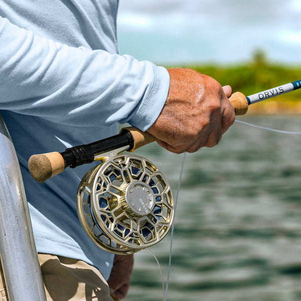 closeup of reel and fly rod