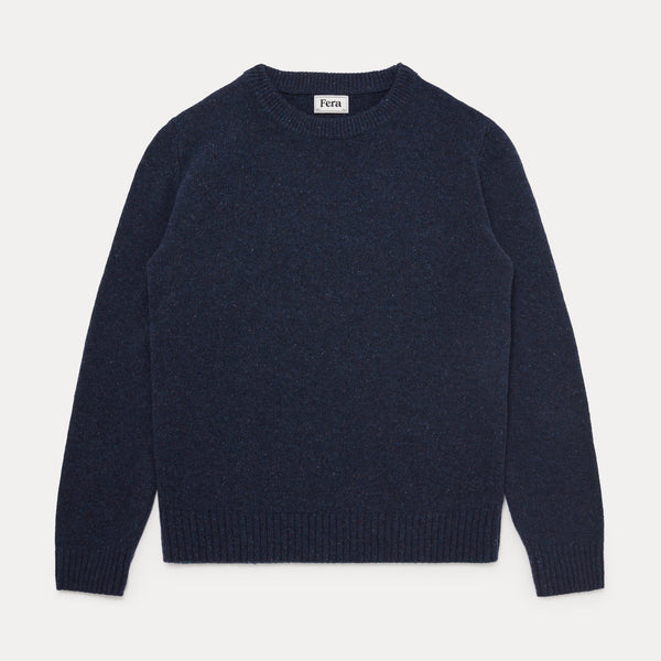dark blue jumper on white background