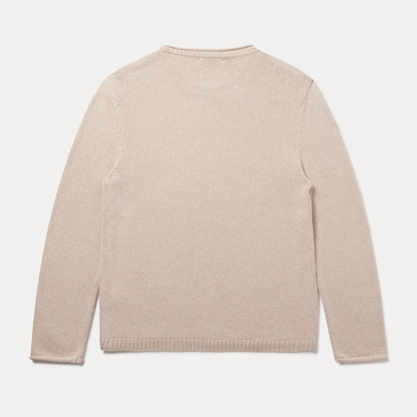 A light beige knit sweater shown from the back, laid flat against a clean, off-white background.