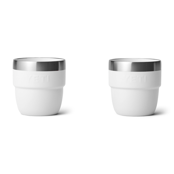 2 white yeti mugs on white background
