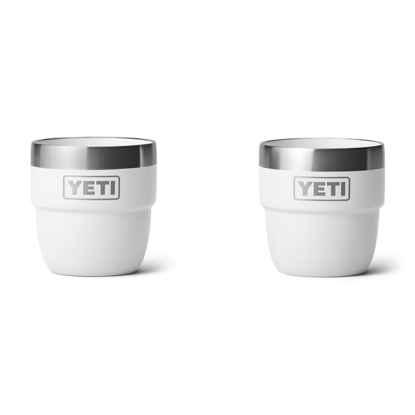 2 white yeti mugs on white background