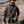Load image into Gallery viewer, man on hill waering military jacket
