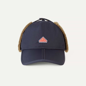 Navy cap with brown earflaps and a logo on a white background
