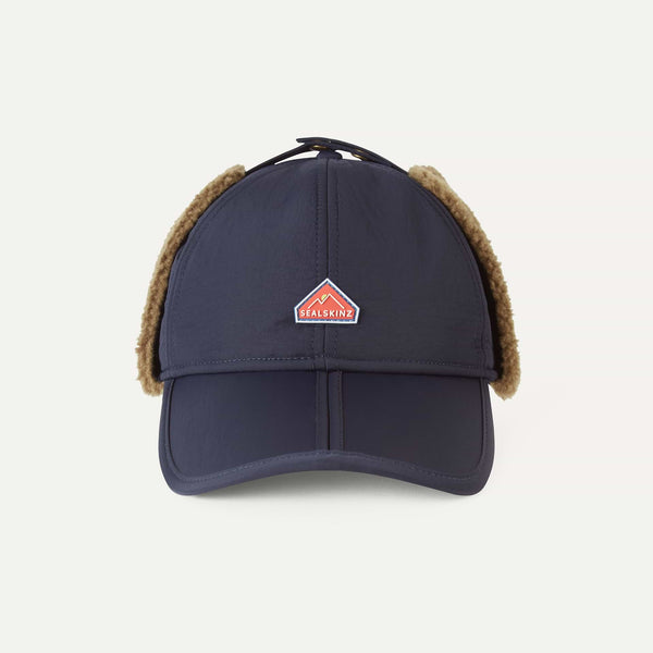 Navy cap with brown earflaps and a logo on a white background