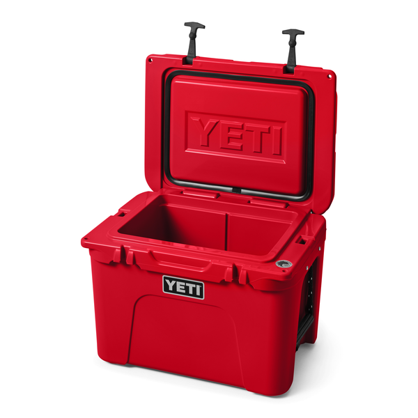 Red YETI cooler with open lid on a white background