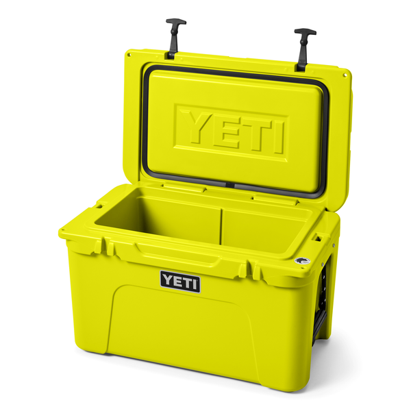Yellow YETI cooler with open lid on a white background