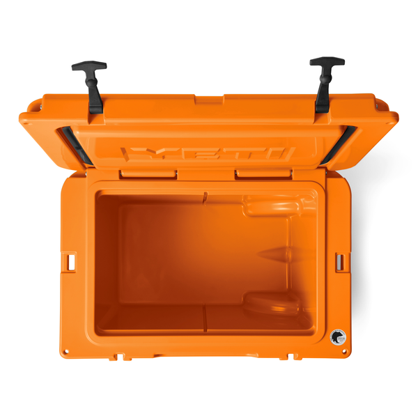 Orange YETI cooler with open lid on a white background
