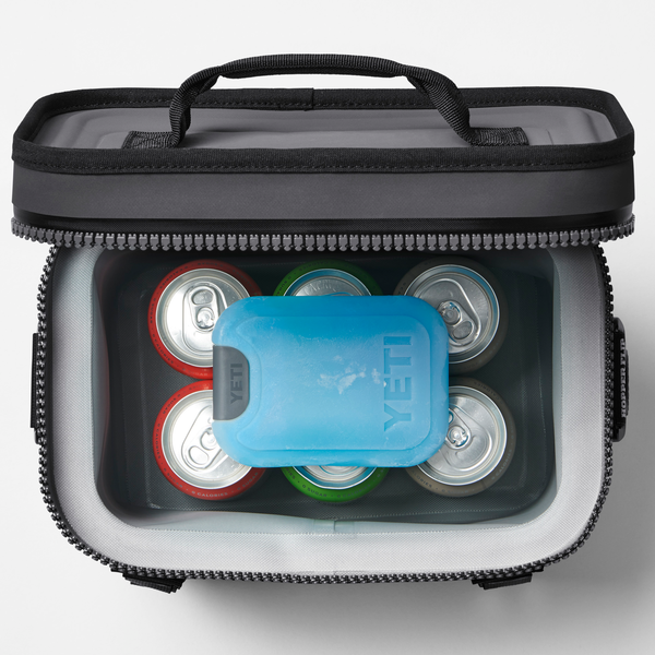 Yeti thin ice small in cooler on top of six cans