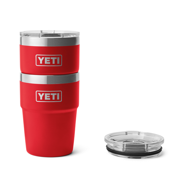 Red YETI tumbler with clear lid on a white background