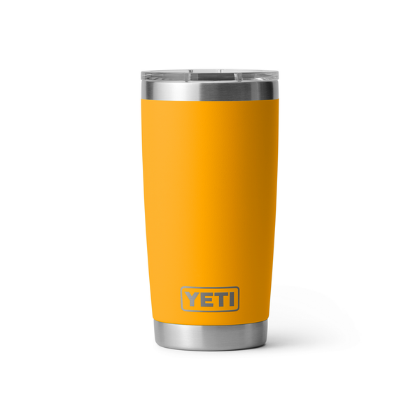 orange yeti rambler on white bankground