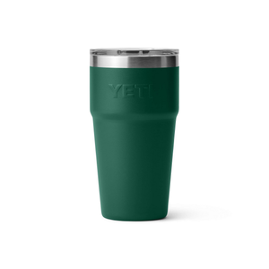Green YETI tumbler with a silver lid on a white background