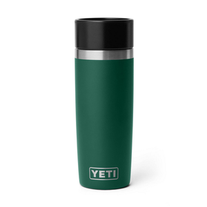 Green YETI mug with a black lid on a white background