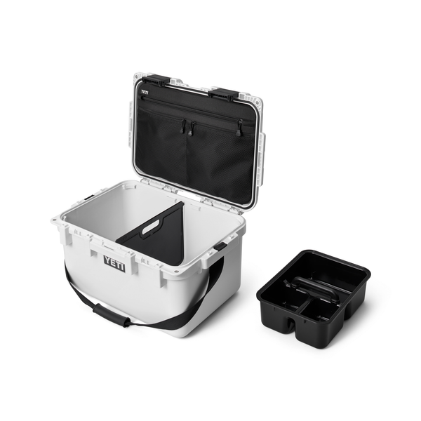 White Yeti cooler box with black interior and carrying handle on a white background