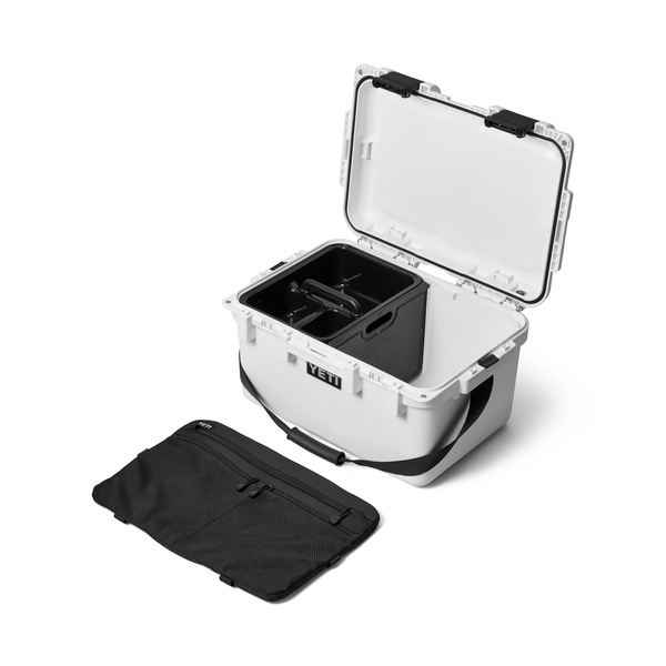 White Yeti cooler box with black interior and carrying handle on a white background