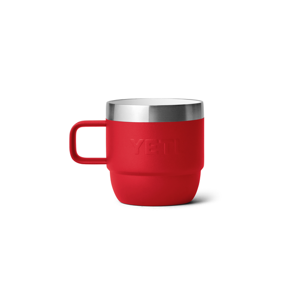 Red mug with silver rim on a white background