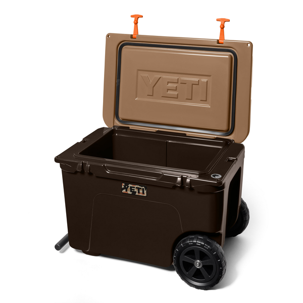 Open brown Yeti Cooler box on white background