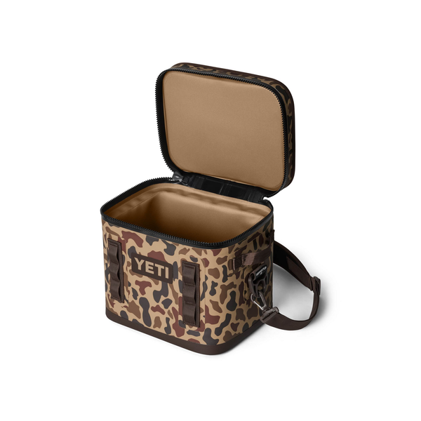 Camouflage-patterned cooler bag with open lid on a white background