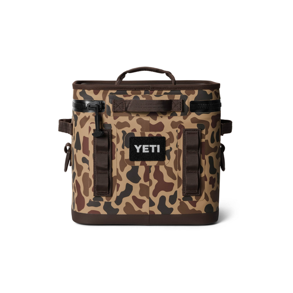 Camouflage-patterned cooler bag with YETI logo on a white background