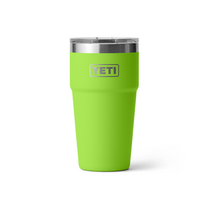 green tumbler on white background