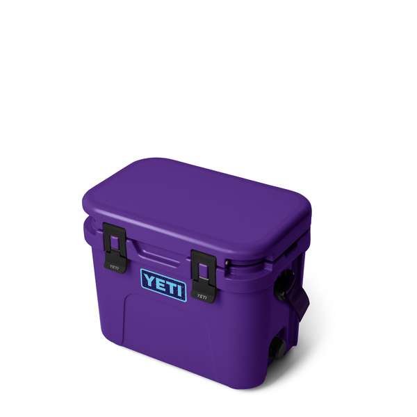 purple yeti hard cooler on white background
