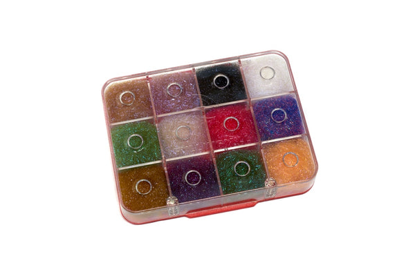 fly tying metarial in box on white background