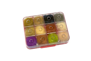 fly tying material in box on white background