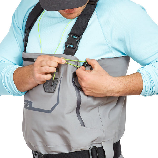 Man wearing Men's Pro Waders in grey, string pull detail