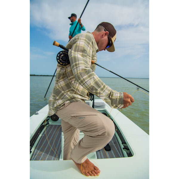 Woman fishing on a kayak in Miami